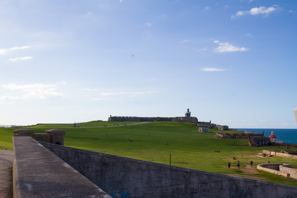 Visitors walk in Castillo San Felipe del Morro, a major tourist attraction in San Juan, Puerto Rico.