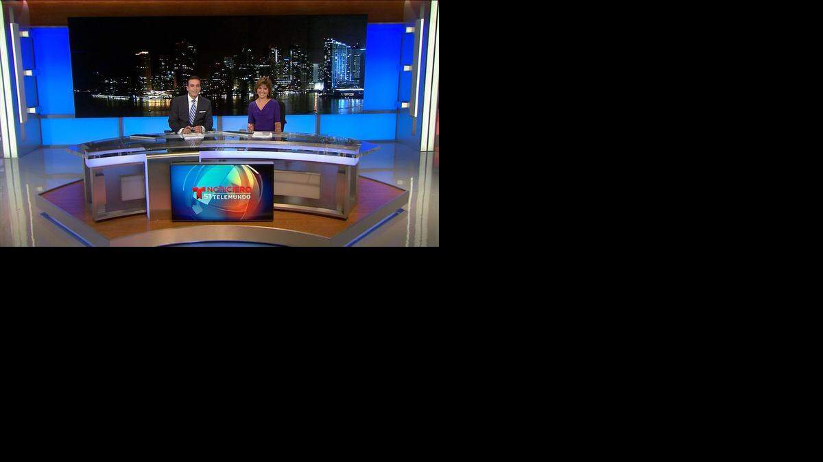 
 Telemundo 51 co-anchors Ambrosio Hernández and Daisy Ballmajó

