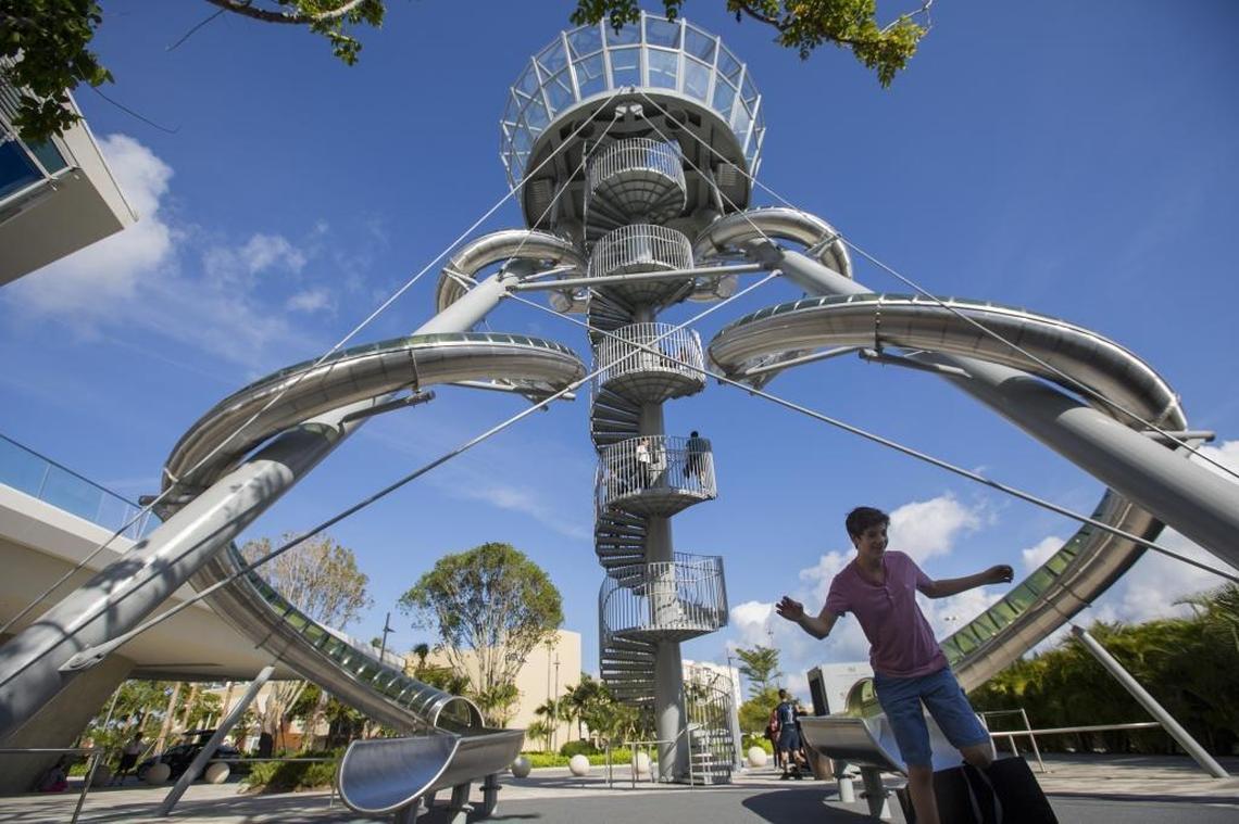 Neil Gilchrist, 15, reacts after going down a new 93-foot-tall slide at Aventura Mall on Monday, Dec. 18, 2017. Aventura Slide Tower, which is free for anyone to use, is part of a three-story wing expansion at the mall. The move added new restaurants, retail stores and an outdoor fountain.