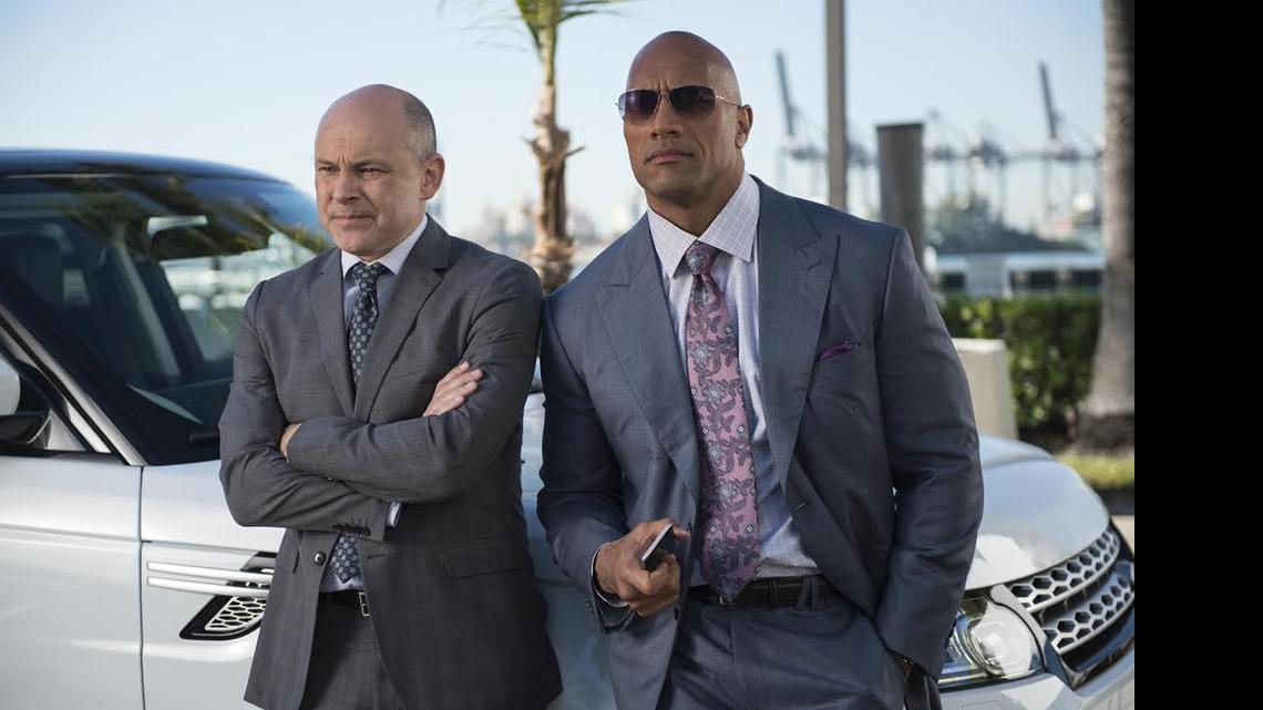 
Rob Corddry and Dwayne Johnson in a scene from HBO’s new series “Ballers,” which was shot entirely in Miami. 
