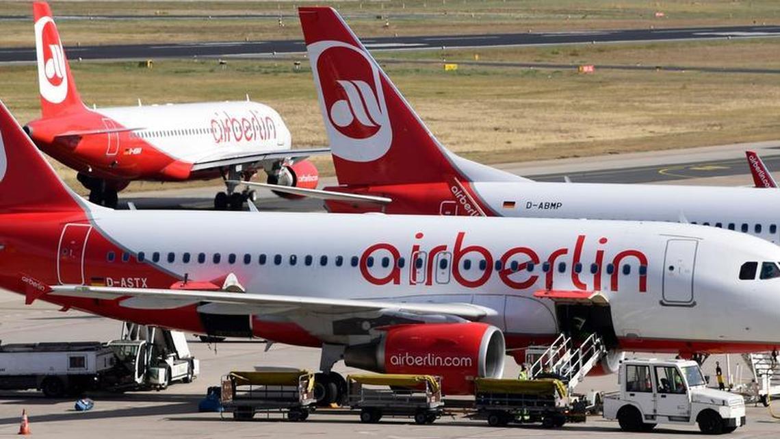 This file photo taken on September 29, 2016 shows aircrafts of German airline Air Berlin standing on the tarmac at the Tegel airport in Berlin. Bankrupt German airline Air Berlin must ground all flights by the end of October, the firm said on October 9, 2017, as talks continue with prospective buyers Lufthansa and Easyjet.