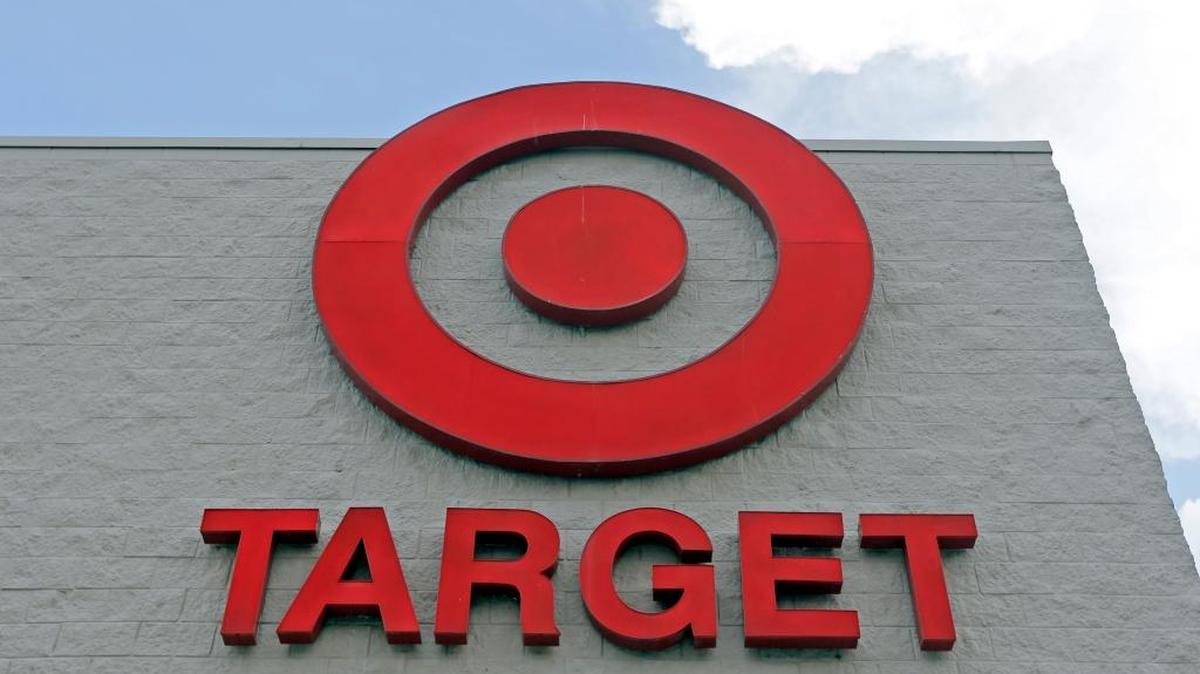 This Wednesday, June 29, 2016, file photo, shows a Target store in Hialeah. Target Corp. is raising its minimum hourly wage for its workers to $11 starting in October 2017 and then to $15 by the end of 2020 in a move it says will help it better recruit and retain staff and provide a better shopping experience for its customers.