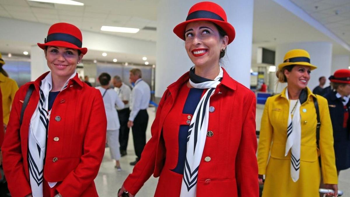 Flight attendant Angela Caldeira arrives with TAP Air Portugal’s flight to MIA on a 1970s-themed aircraft, including retro food service, music and safety video, August 11, 2017. According to a recent survey by the Association of Flight Attendants-CWA, nearly 70 percent of flight attendants in the U.S. have experienced sexual harassment in their careers.
