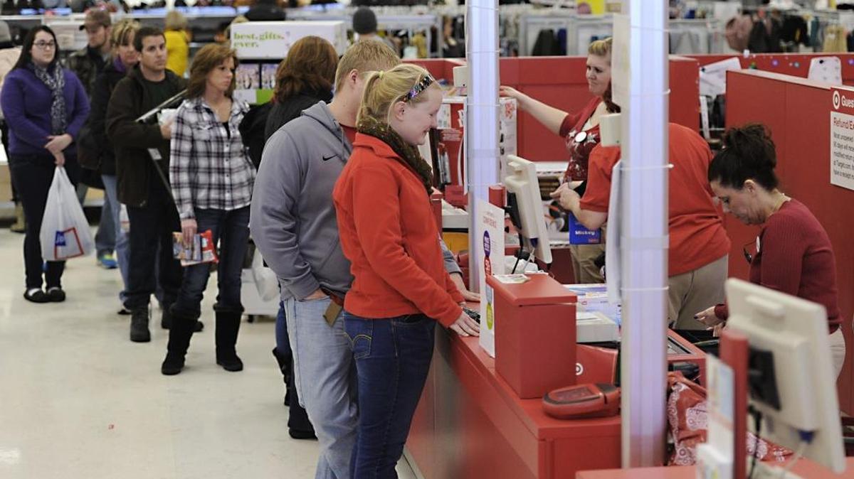 In this file photo customers return items during the holiday season.