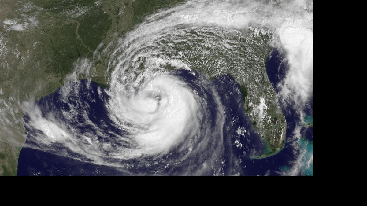 
 In this handout satellite image provided by National Oceanic and Atmospheric Administration (NOAA), Hurricane Isaac moves toward the Gulf Coast on August 28, 2012 in the Atlantic Ocean. 
