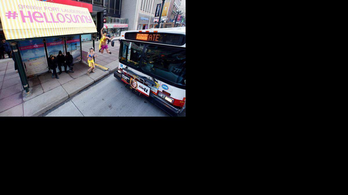 
The Greater Fort Lauderdale Convention & Visitors Bureau sent sunny sentiments to downtown Chicago with branded (and heated) bus shelters, swimsuit models and chances to win trips on Tuesday. 
