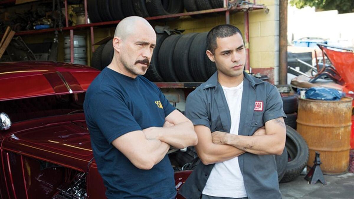 Demián Bichir and Gabriel Chavarria play father and son in ‘Lowriders,’ the first theatrical release from Telemundo Films, due in theaters May 12.
