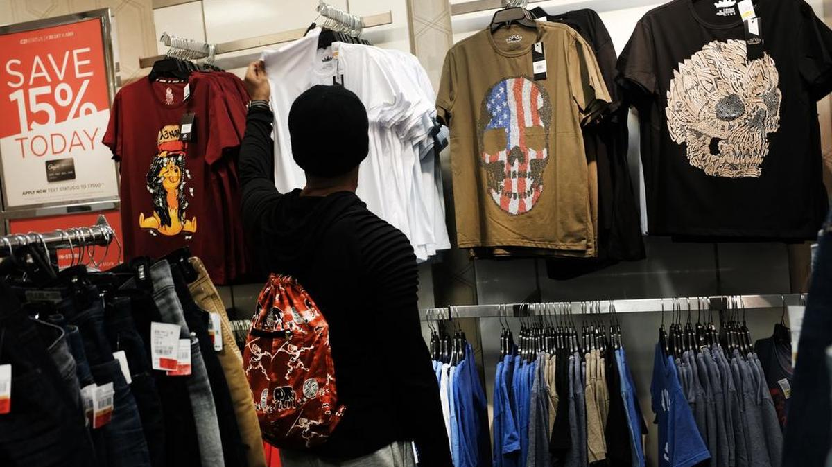 Chinese made shirts, including one with the colors of the American flag, are displayed for sale at a Manhattan department store in New York. President Donald Trump may insist China pays for the American tariffs, but any financial cost gets passed on to U.S. companies and ultimately to their customers. For companies selling a lot of “Made in China” items, that eventually is going to mean higher prices.