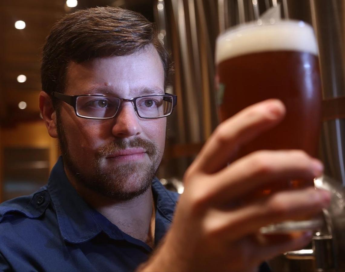 Carnival Vista’s brewmaster Colin Presby brews several hundred pints of beer for cruise ship travelers.