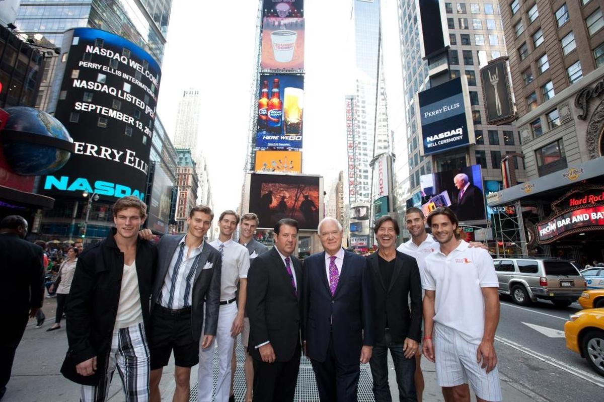 Executives for Perry Ellis rang the closing bell on Sept. 13, 2010 at the Nasdaq stock exchange. In Times Square, New York City, Perry Ellis International executives are flanked by fashion models. Center right is George Feldenkreis, the chairman and chief executive office of the Miami-based company. Center left (dark hair) is Oscar Feldenkreis, the company’s vice chairman, president and chief operating officer.