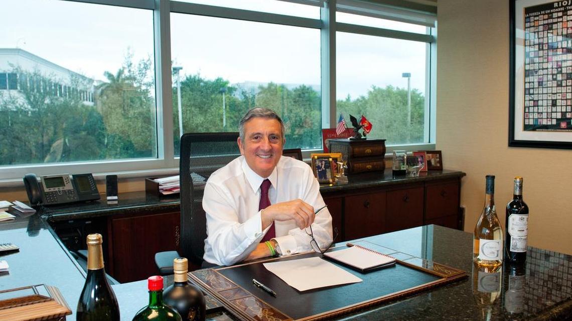 Bruce Hunter Managing Director of Shaw-Ross International Importers at his office in Miramar on Nov. 8.