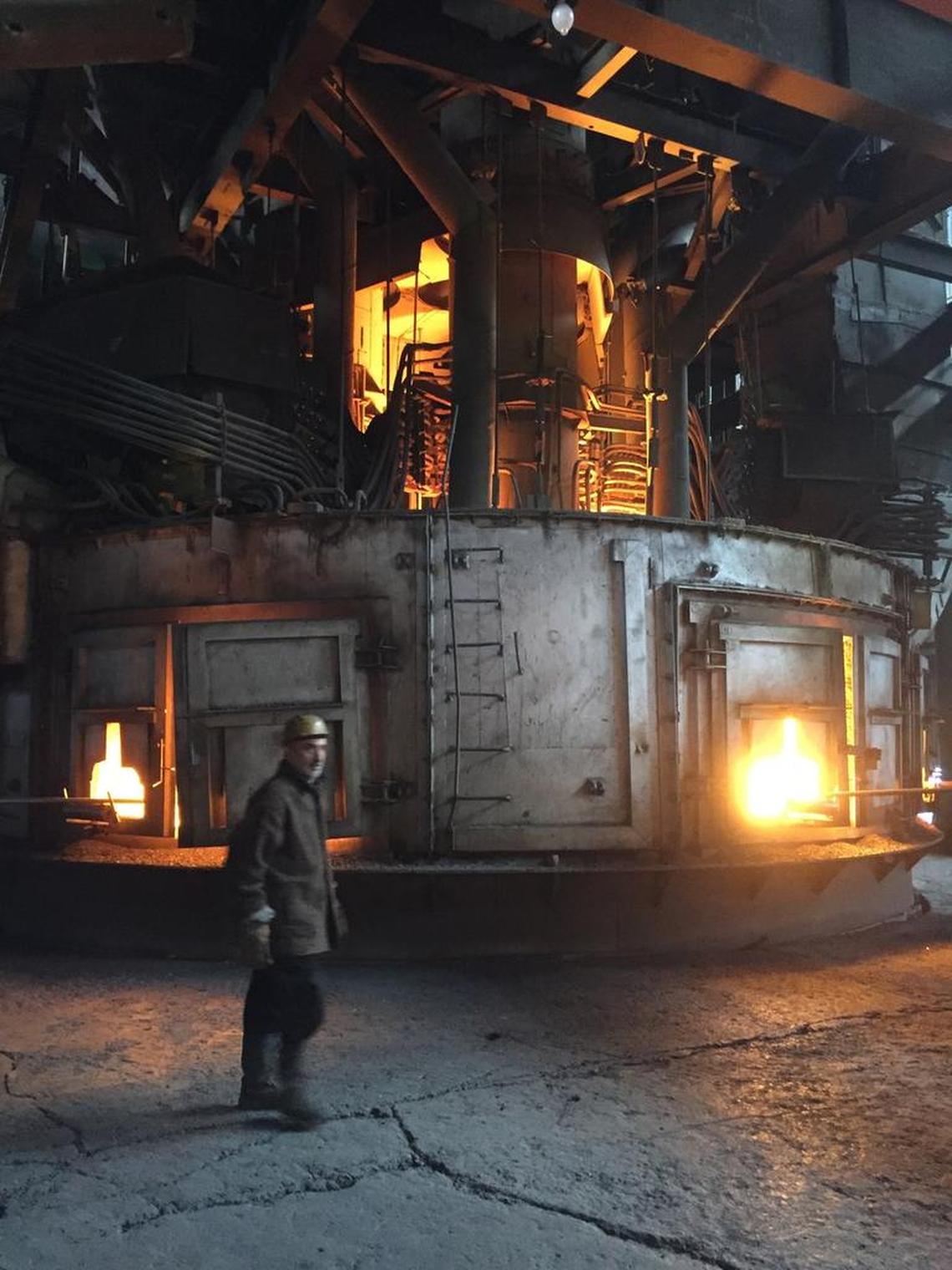 Electric-powered arc furnaces are like mini-volcanoes. This one uses 25 megawatts, partly supplied by a company-owned hydroelectric dam and power plant.