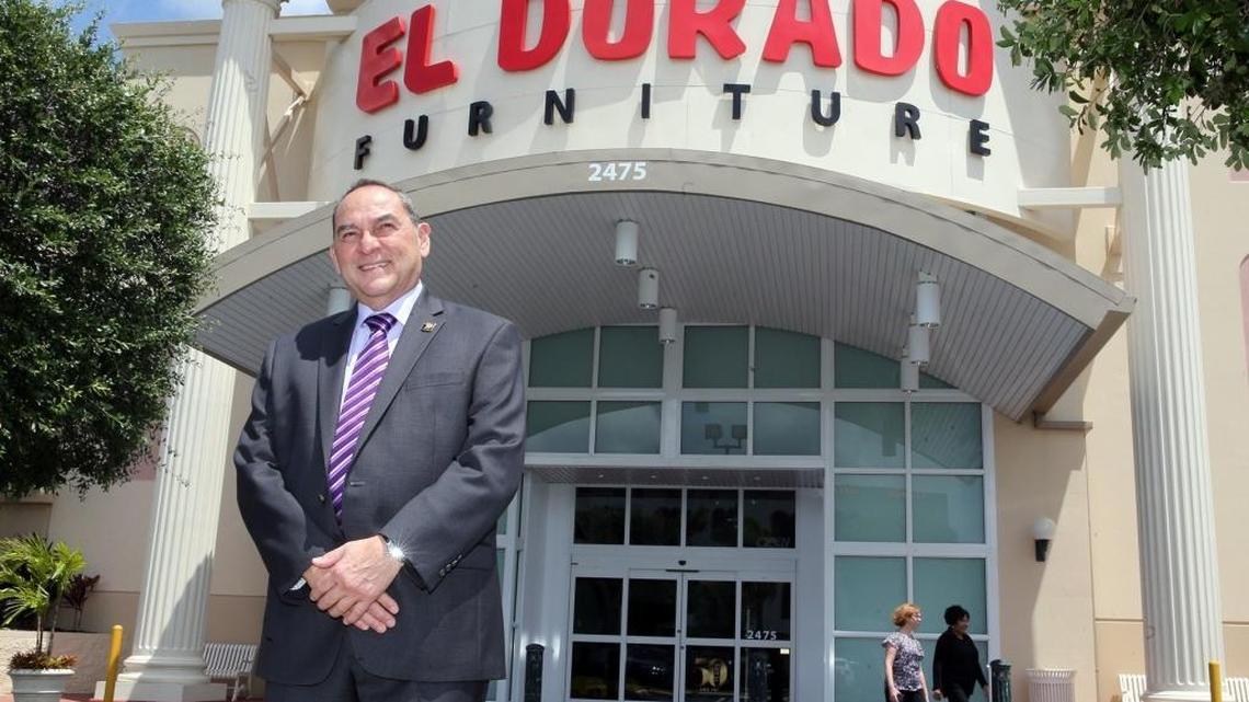 Luis Capó, son of the El Dorado furniture store founder Manuel Capó, outside the Southwest Eighth Street store on April 28. El Dorado Furniture turns 50 years old. The business was established at the same address, 2475 SW Eighth St., in 1967.