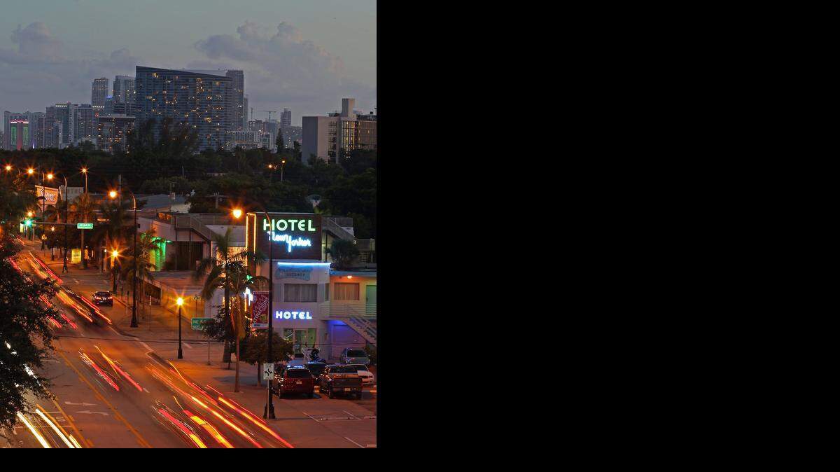 
Miami's MiMo District’s busy business Biscayne Boulevard corridor is being transformed with boutique motels, shops, and restaurants. Commuters make their way southbound passing newly renovated motels and store fronts.
