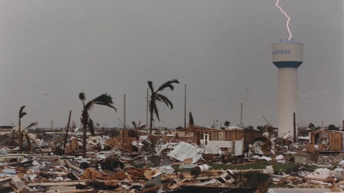 On the seventh day after Hurricane Andrew in 1992, thunderstorms swept through South Dade, once again drenching furniture in exposed houses and leaving many people mired in mud. This stark scene, near Homestead’s city hall, shows in graphic detail the devastation the city suffered.