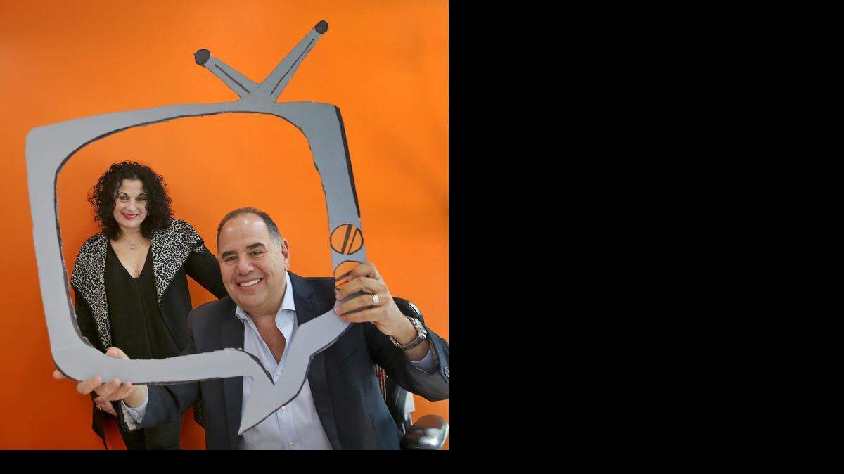 
The Kitchen’s vice president Deeny Kaplan, left, and president and CEO Ken Lorber goof around at the language-dubbing company’s Miami offices in Edgewater. 
