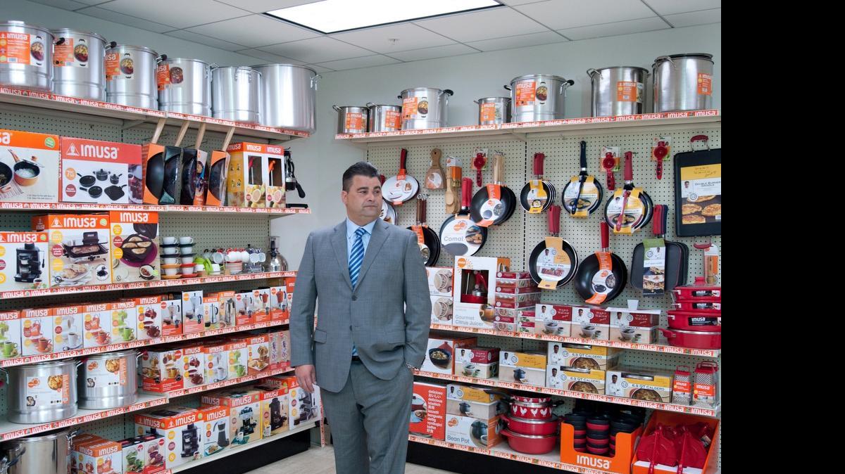
Raul Corzo, president of Imusa USA, in front of a display of products at the corporate office in Doral on June 23, 2015.
