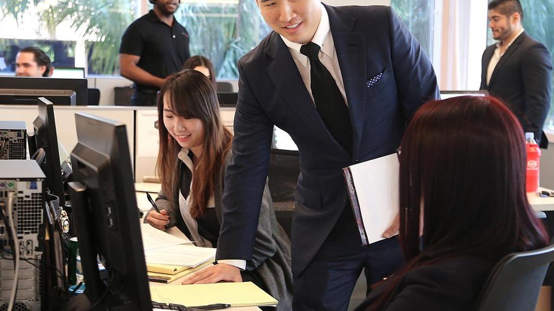 Tri Nguyen, CEO of Network Capital Funding Corporation, a California-based private mortgage lender that has opened a big center in Miami to train millennials in finance for the company, at his office near Miami International Airport.