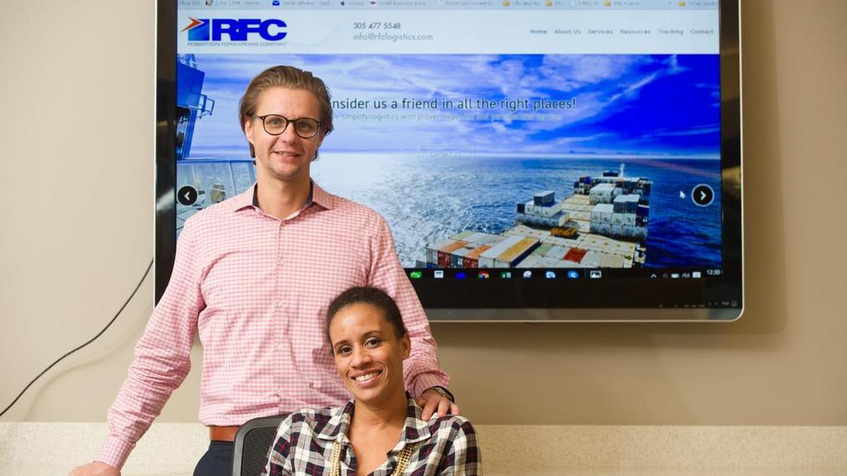 Stefan Ahrens, managing director of Robertson Forwarding Co., and Jennifer Robertson-Ahrens, president of the company, at their headquarters in Allapattah.