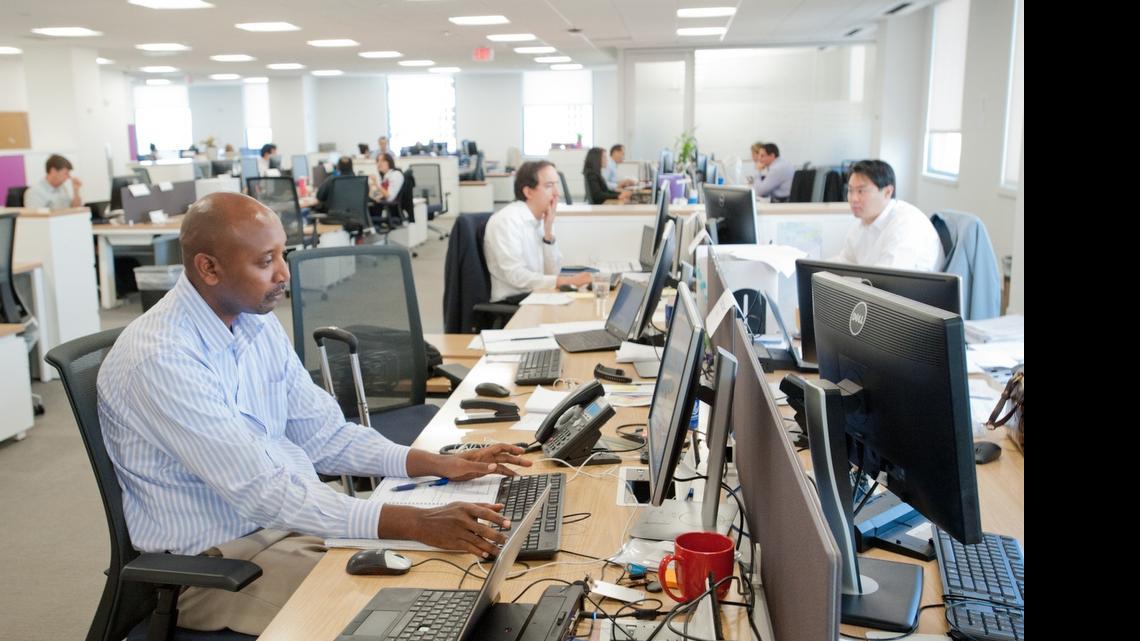 
Workers in one of the operations rooms at the Cable and Wireless Communications group operating hub for the Caribbean and Latin America on June 16, 2015, in Coral Gables.
