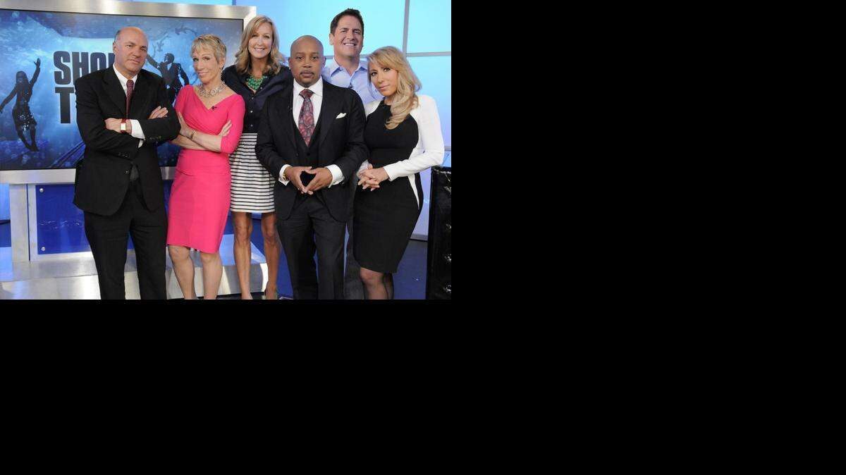 <cutline_leadin>‘Shark Tank’:</cutline_leadin> Kevin O’Leary with fellow sharks Barbara Corcoran, Daymond John, Mark Cuban and Lori Greiner and ‘Good Morning America’ host Lara Spencer, center.<252><252><252> <137>The show, now in its fifth season, airs Fridays at 9 p.m. EDT. (AP Photo/ABC, Lorenzo Bevilaqua)<137>