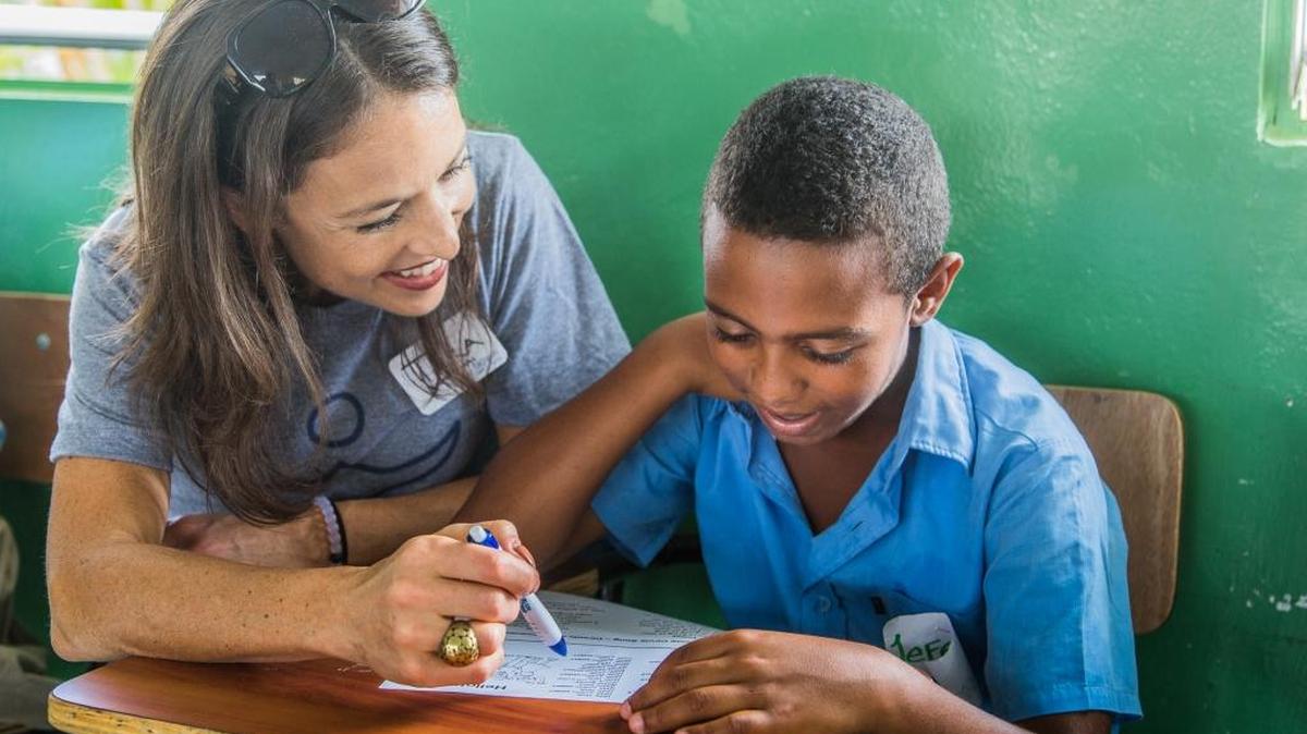 Tara Russell, president of Fathom, with a student in the Dominican Republic. Fathom’s week-long cruises to Puerto Plata on the northern coast of the Dominican Republic focus on social impact and volunteer activities.