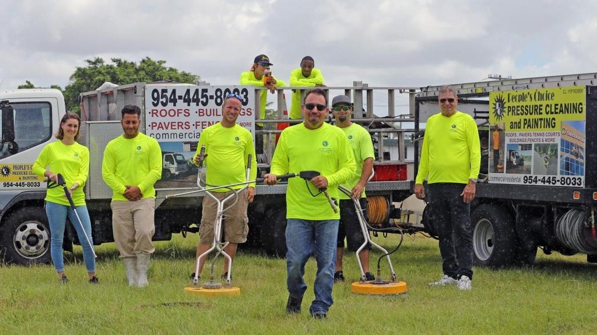 Steve Landis, owner of People’s Choice Pressure Cleaning & Painting, is seen with his crew and trucks. Landis is looking for a plan to grow his business strategically.