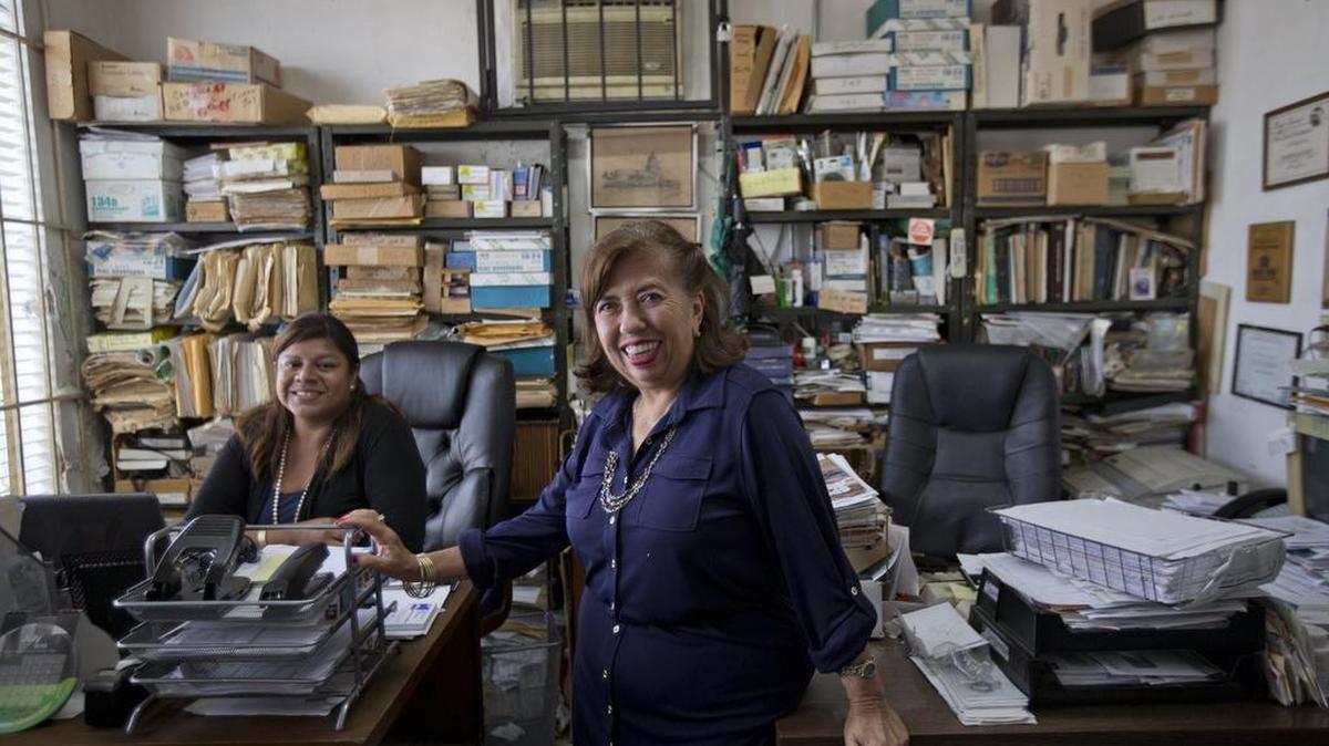 Margarita Hernández, right, owner of AAA Million Auto Parts, and daughter Cristina Hernandez in July. SCORE counselors spent three weeks at the Little Havana company.