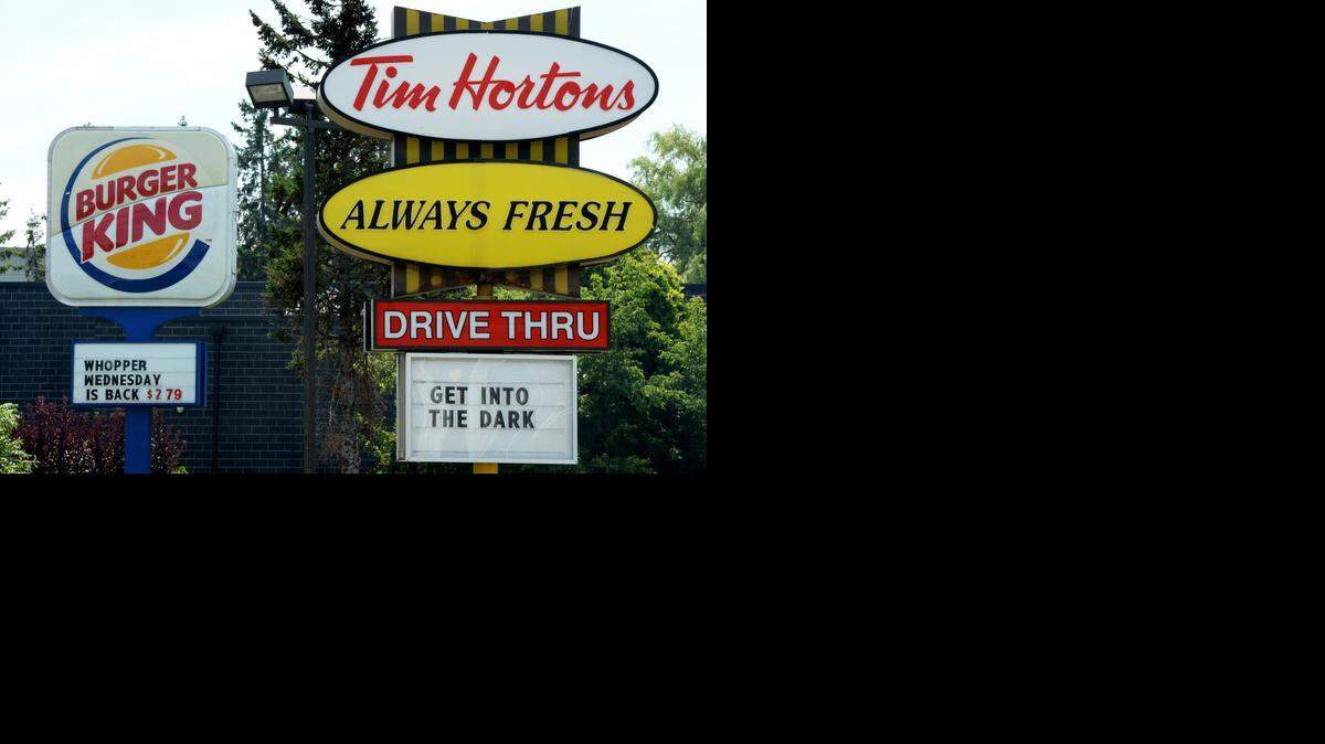 <cutline_leadin>New partners:</cutline_leadin> <137,2014/12/26,Clarke/c Rosemary (Rory) - Miami1>Burger King Tim Hortons signs are displayed on St. Laurent Boulevard in Ottawa.<137> Canada's Tim Hortons and Miami-based Burger King say they will join forces. <137>, but will operate as independent brands to form the world's third-largest quick service restaurant company.<137>