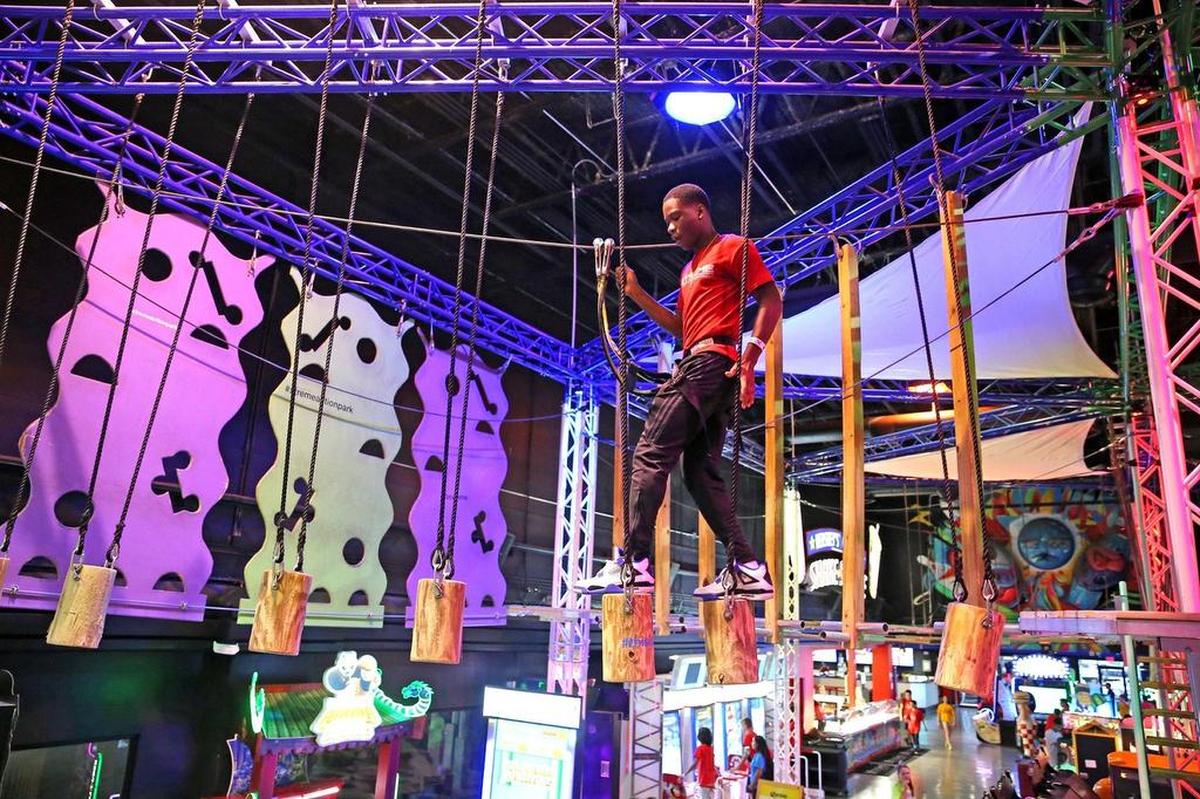 Joseph Louizaire walks on the Rope Course at Xtreme Action Park, a 230,000-square-foot entertainment complex.