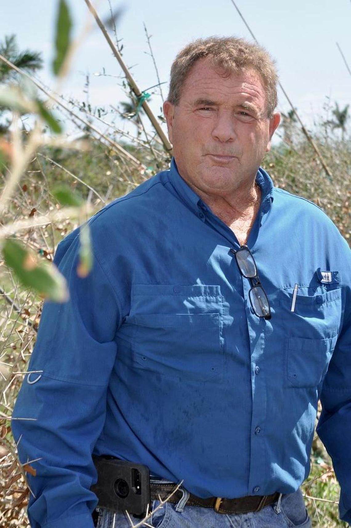 In Homestead, John Alger has been staking many of his storm-damaged oak trees in hopes of saving them.