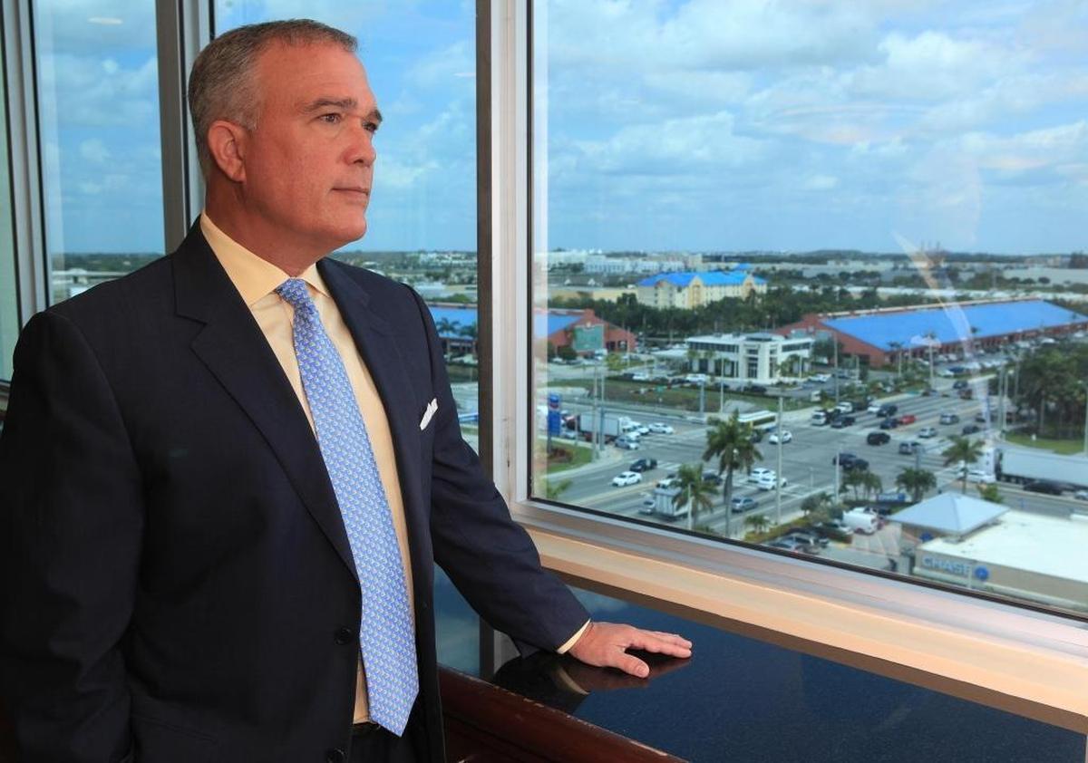 Luis de la Aguilera, the president and CEO of U.S. Century Bank, one of the state’s largest Hispanic-owned community banks, poses at his offices on Thursday, May 11, 2018.
