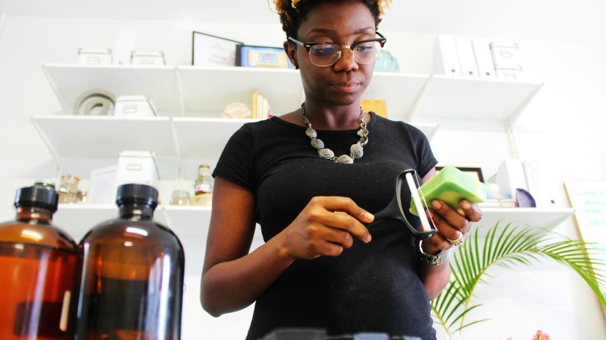 
Barbara Jacques, founder of Jacq’s Organics in Dania Beach, works on her all-natural soaps and other skincare products.
