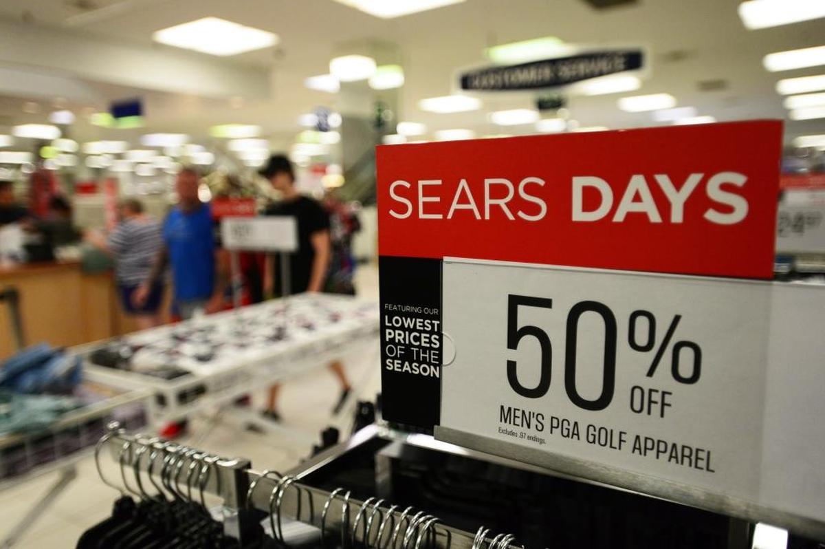 A sign giving information on a sale is displayed at a Sears location in Ottawa, Ontario, Canada, on Thursday, June 22.