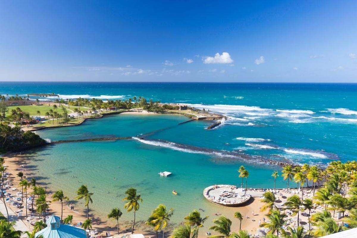A beach in Puerto Rico, where tourism is the top industry.