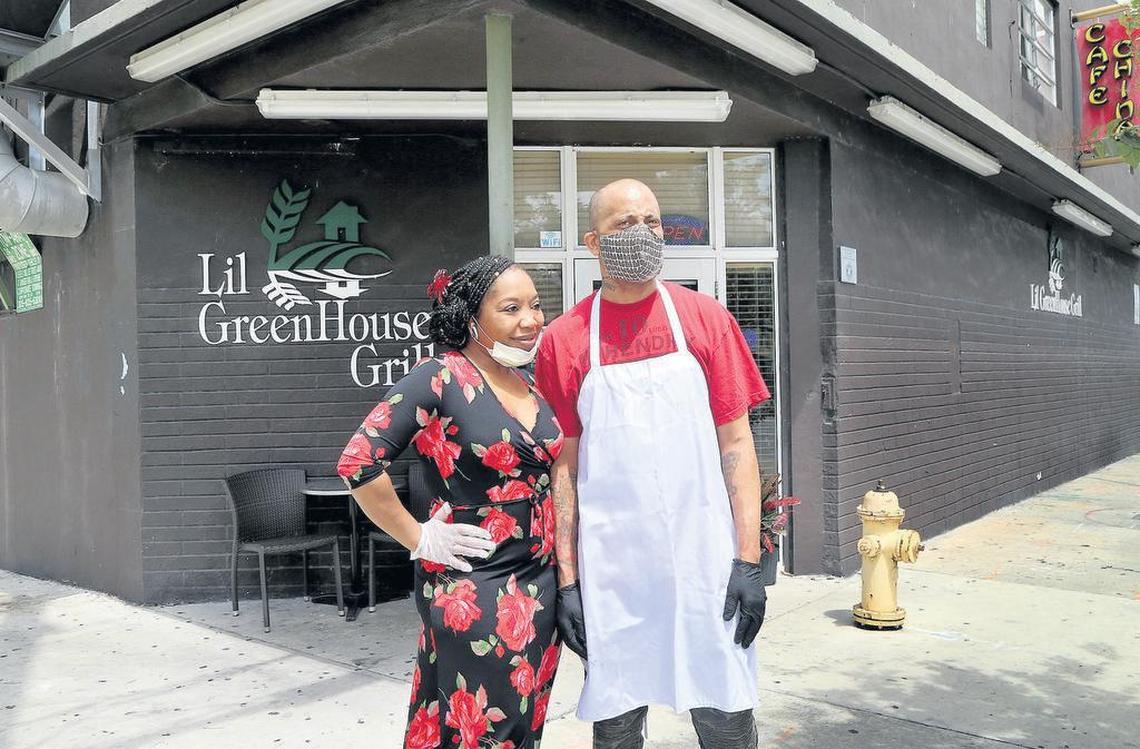 The co-owners of Lil Greenhouse Grill restaurant, Nicole Gates and executive chef Karim Bryant, in front of their business.