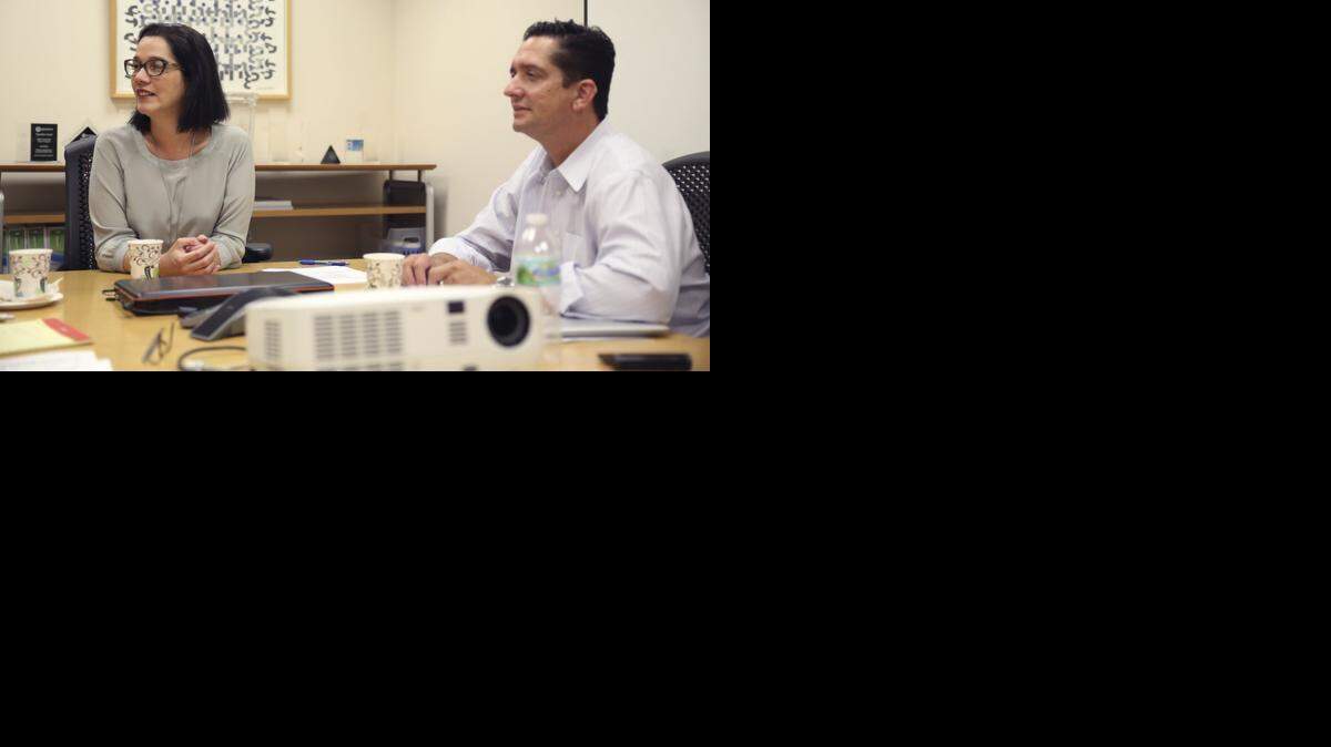 
Anabel Perez and Juan Sanchez of the Miami-based NovoPayment, a leading provider of pre-paid services in Latin America, are shown at the their Brickell office on Friday, September 26, 2014.
