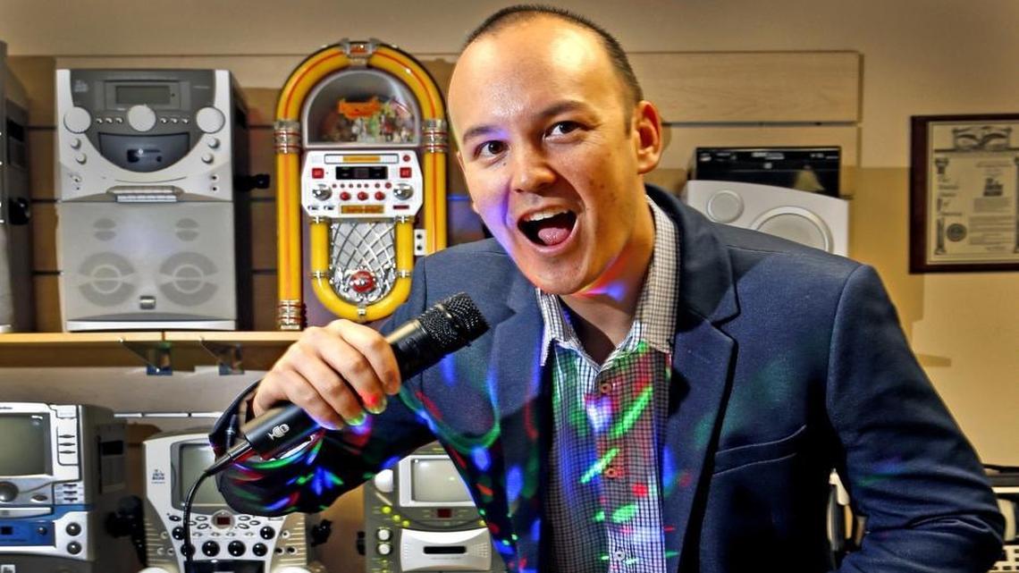 The Singing Machine Co. CEO Gary Atkinson tries out one of the company’s home-karaoke machines in their Fort Lauderdale headquarters.