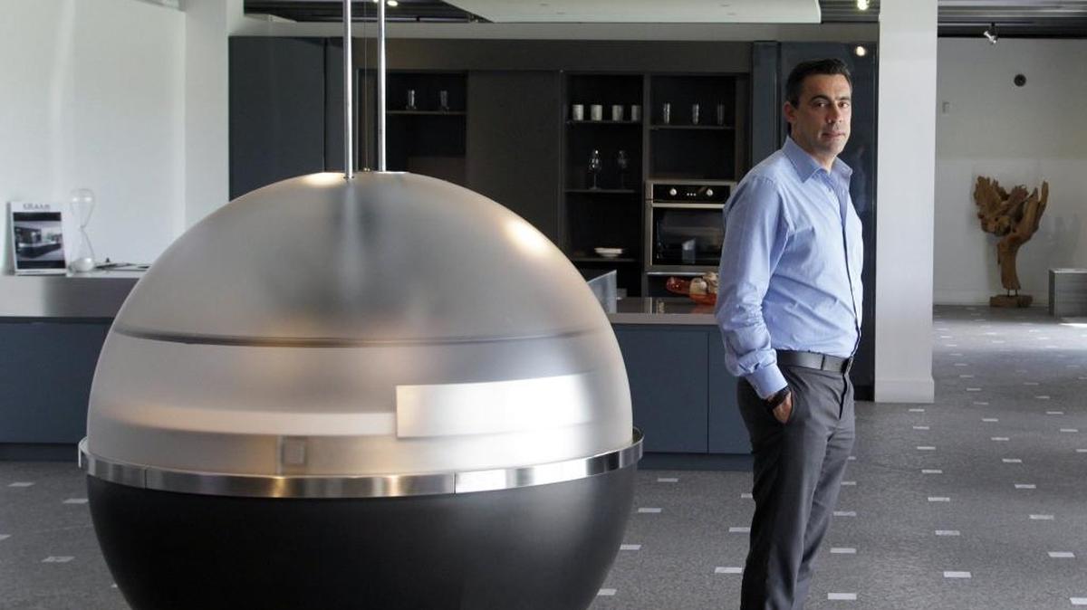 Alex Xakoustis, the owner of Italkraft, is photographed in his Doral showroom.