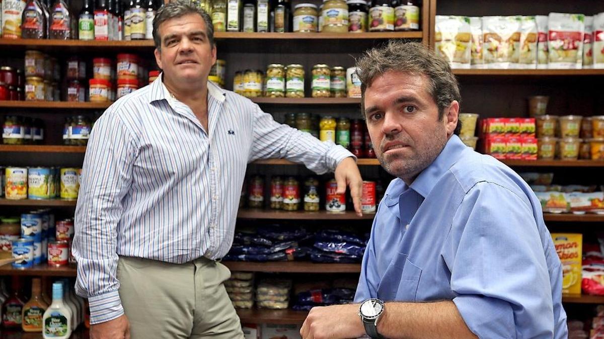 CEO Marcelo Young, left, and Francisco Young, the executive VP of Transnational Foods Inc., at their office at 1110 Brickell Ave., Miami, on Dec. 12. Transnational Foods Inc. is a Miami-based company that imports hundreds of food products from 25 countries and distributes them, either under its own brands or private labels, to supermarkets, convenience stores and other retail outlets throughout the United States.