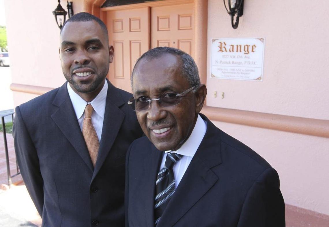 Patrick Range Jr., left, and his father, Patrick Range, at their family’s Range Funeral Home, at 5727 NW 17th Ave. Patrick Range Jr, worked for a law firm before he went to work with his dad.