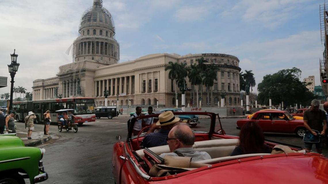 Tourists set off for a spin in a classic American convertible car in Havana, Cuba on Jan. 16, 2015. The Capitol Building is in the background. South Florida CEOs on the Miami Herald’s CEO Roundtable were asked: Have you ever been to Cuba? Do you plan to go? Why or why not?