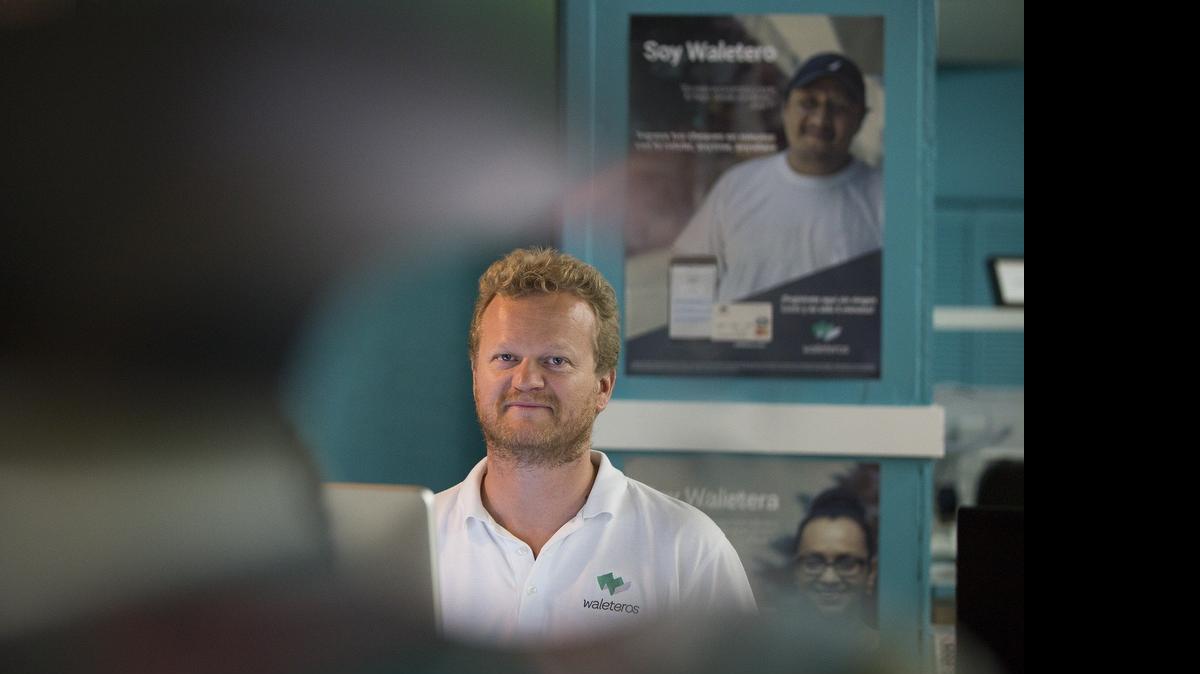 
Waleteros co-founder Etienne Gillard, 44, works at his computer in the office space at Ventura Hive. Waleteros offers a smartphone-based banking solution for the millions of people in the U.S. who don't have or use a bank account, of which Hispanics represent a disproportional percentage.
