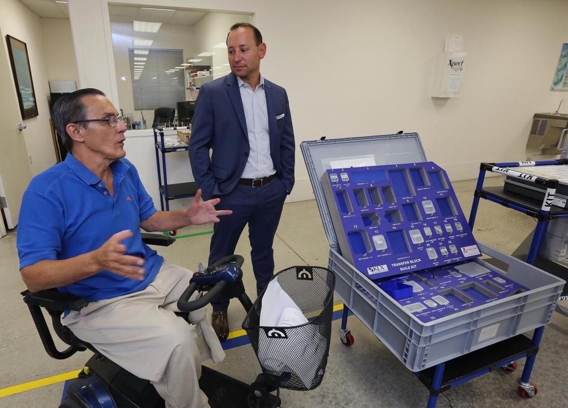 From left: Eduardo Limia, manager of plant kitting, and John Cuomo, group vice president and general manager of KLX Aerospace Solutions, in the company’s headquarters.