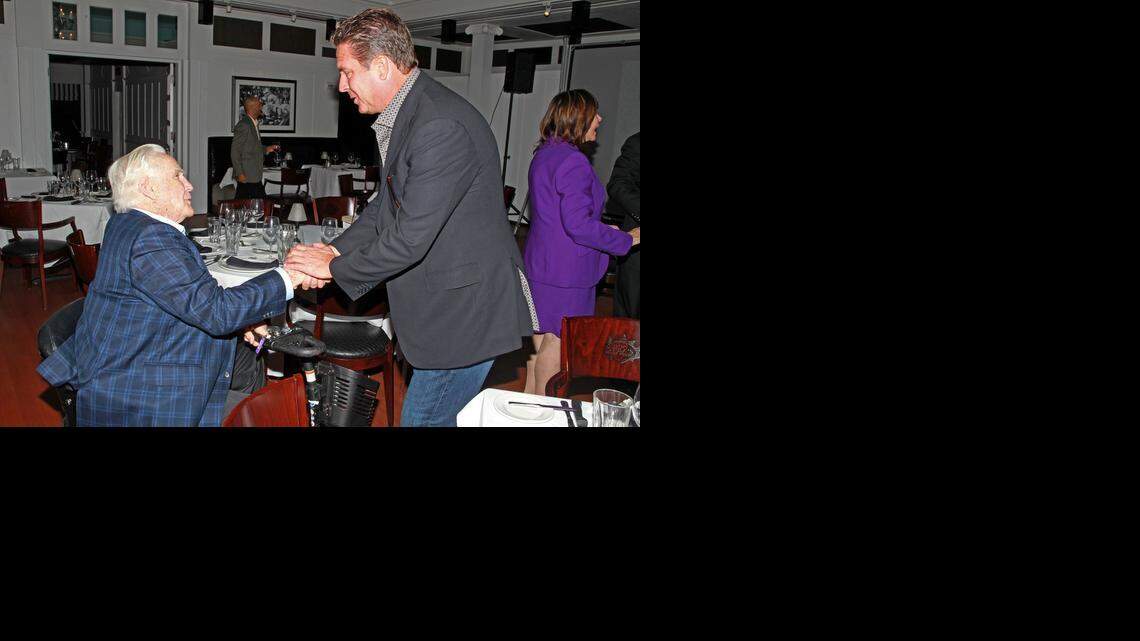 
Don Shula with former Miami Dolphins quarterback Dan Marino at Shula’s Steak House in Miami Lakes. They are at an event to commemorate 25 years of Shula’s Restaurants on Nov. 5, 2014. 
