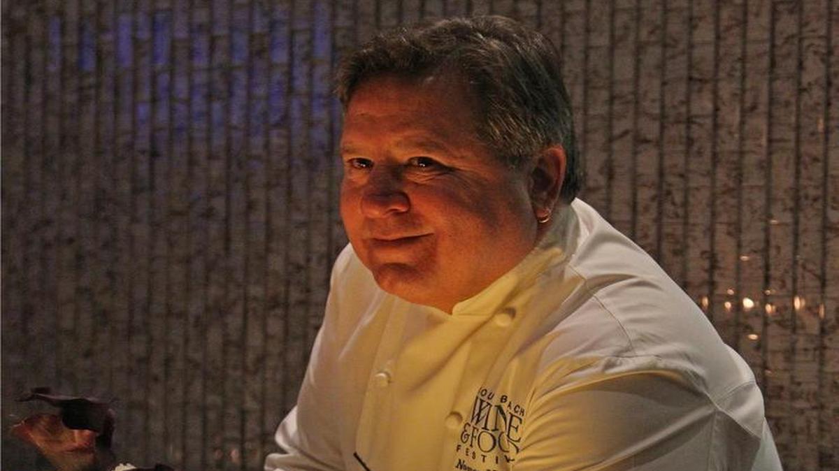 Norman Van Aken, shown here, is opening a cooking school at the Vagabond Hotel on Biscayne Boulevard in Miami with chef and partner Candace Walsh.