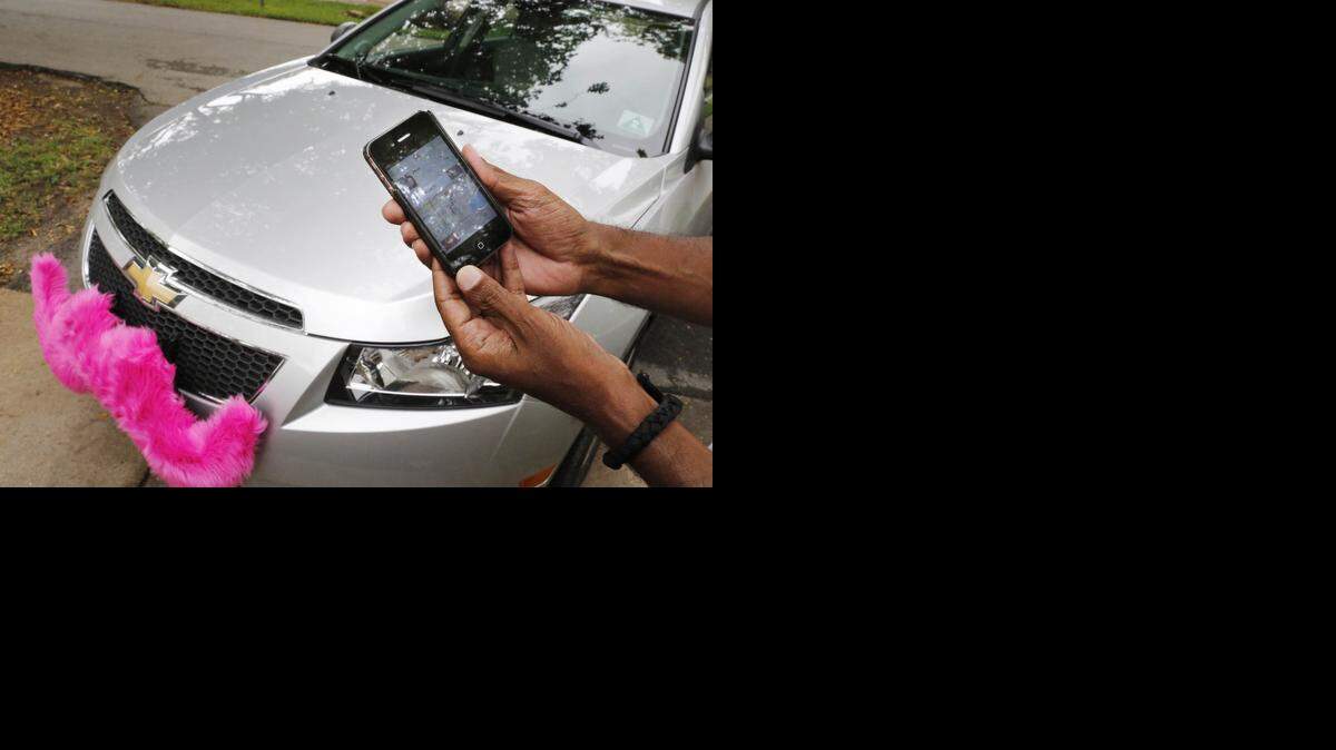 
Lyft car service, pirctured here, launched in Miami-Dade County in May, and UberX began operating in June.


