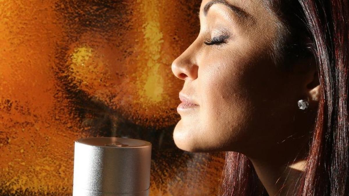 
Farah Abassi, with a Mini360 diffuser in her Boca Raton office. Aroma360 opened an office in Mexico in July.


