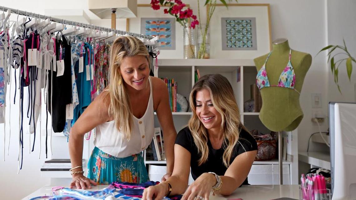 Fashion law attorney Danielle Garno, right, chats about swimwear with her client Bianca Coletti, a designer. Garno, a Greenberg Traurig shareholder, wants to specialize in design-industry issues such as the Foreign Corrupt Practices Act and trademark infringement.