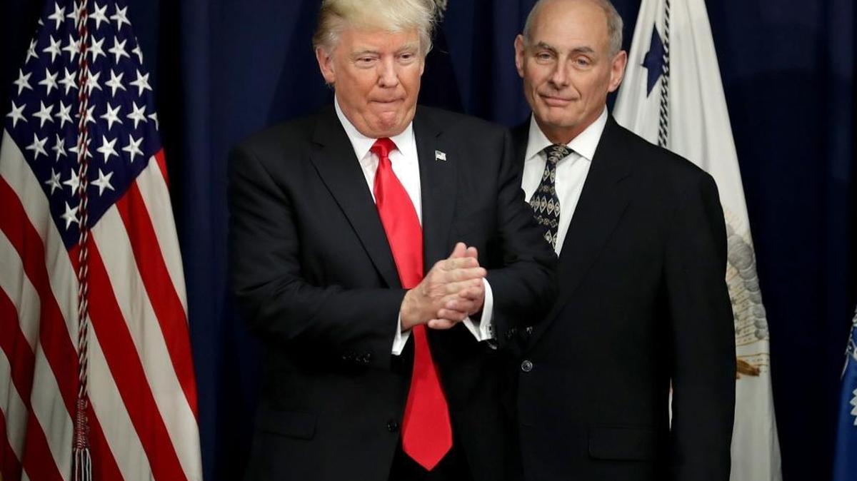 U.S. President Donald Trump is joined by Homeland Security Secretary John Kelly during a visit to the Department of Homeland Security on Jan. 25 in Washington, D.C. Kelley and Secretary of State Rex Tillerson are scheduled to visit Mexico on Thursday.